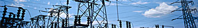 Transmission line towers and a substation